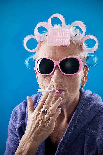 Senior woman with curlers  ugly old women stock pictures, royalty-free photos & images
