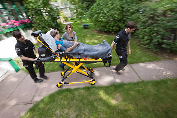 Senior Woman with Emergency Medical  Help stock photo