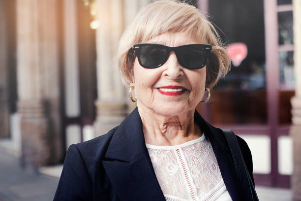 Senior woman with sunglasses stock photo