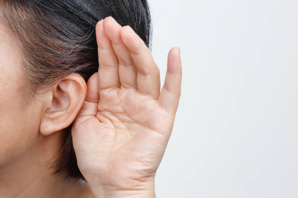 Seniors woman hearing loss , Hard of hearing stock photo