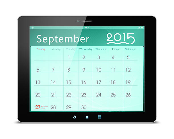September 2015 Calender on digital tablet (Clipping path!) isolated on white