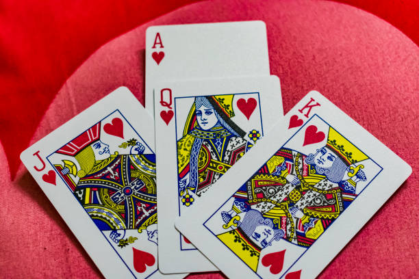 A sequence of jack, queen, king and ace close view of hearts playing card. stock photo