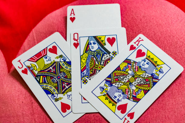 A sequence of jack, queen, king and ace close view of hearts playing card. stock photo