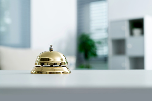 Service bell on white table.