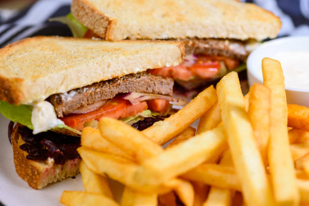 A serving of Steak Sandwich with French Fries stock photo