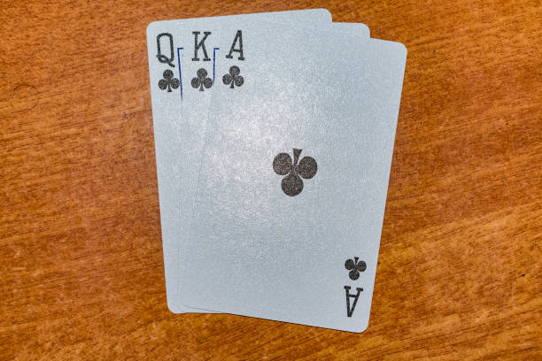 A set of ace,king and of clubs color of Playing card laying on the table with an arrangement. stock photo