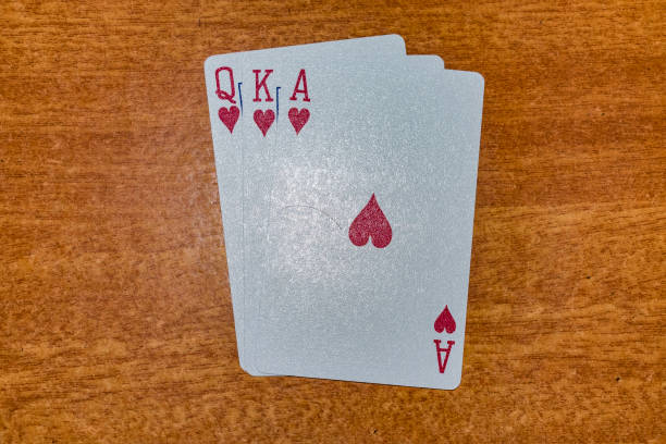 A set of ace,king and of hearts color of Playing card laying on the table with an arrangement. stock photo
