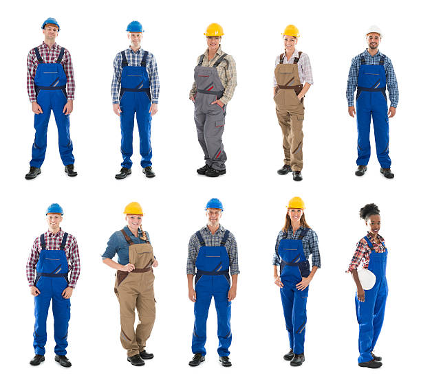 Set Of Construction Workers Set Of Construction Workers Standing Against White Background african american plumber stock pictures, royalty-free photos & images