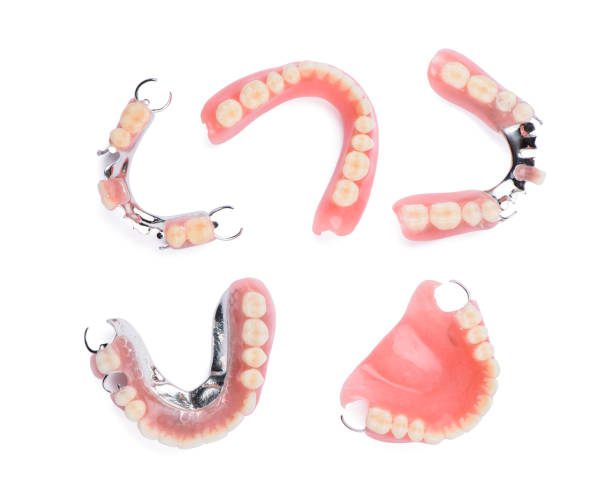Set of dentures on white background stock photo