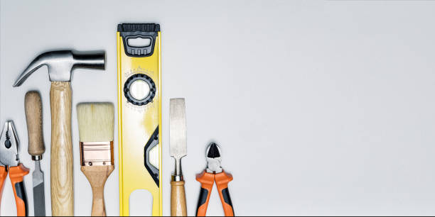 Set of different construction tools on bright grey background. Banner with copy space. DIY concept. stock photo