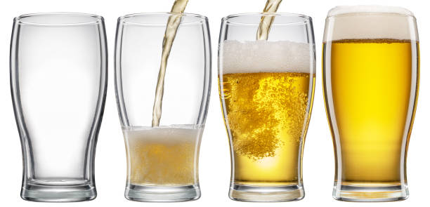 Set of four glasses with different beer level. Pouring beer into the beer glass isolated on white background. File contains clipping path. stock photo