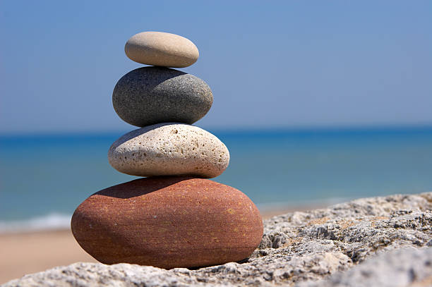 Set of four stones on top of each other signifying Zen stock photo
