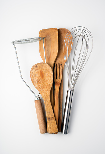set of kitchen utensils on a light background picture id1298975671?b=1&k=20&m=1298975671&s=170667a&w=0&h=wtISmAkkdibRMEFMTsBGo7RN3btFBwu9Zje3VUZwPz4= - Stainless steel utensils: how to pick the best ones￼