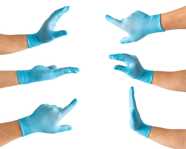 Set of male doctor`s hands in blue glove isolated on white background stock photo