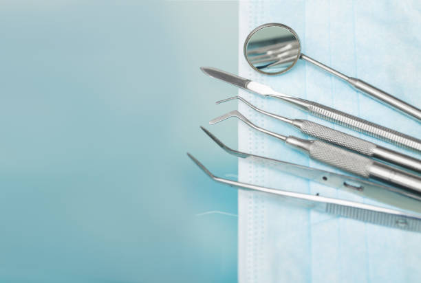 Set of metal Dentist's medical equipment tools stock photo