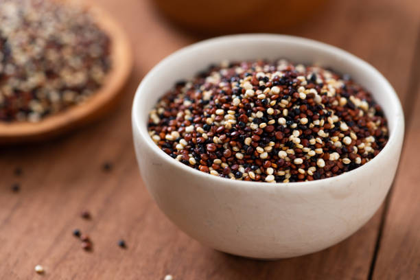 Set of quinoa Red, white and brown quinoa. stock photo