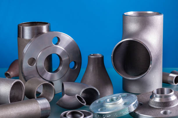 Set of steel welding fittings like tees, elbows, flanges, reducers, sockets, nipples, cups and others. stock photo