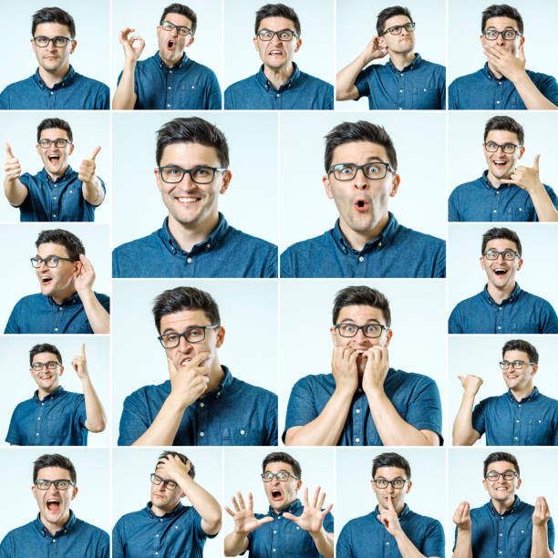 Set of young man's portraits with different emotions and gestures isolated Set of young man's portraits with different emotions and gestures isolated big smile emoji stock pictures, royalty-free photos & images