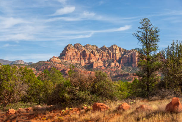 Seven Warrors Seven Warriors is a long ridge with seven prominent peaks.  This view of Seven Warriors was photographed from the Turkey Creek Trail in the Coconino National Forest near the Village of Oak Creek, Arizona, USA. jeff goulden sedona stock pictures, royalty-free photos & images