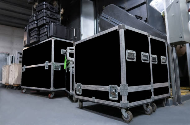 Several large black road cases stock photo