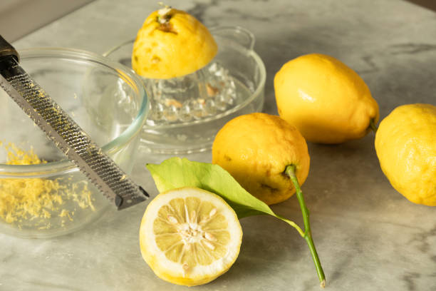 Several Menton lemon, grater and Lemon's Zest stock photo