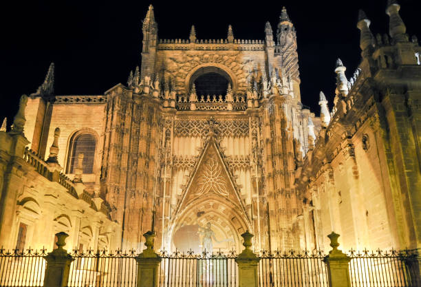 Seville Cathedral at night in ANdalusia, Spain Seville Cathedral at night in ANdalusia, Spain seville cathedral stock pictures, royalty-free photos & images