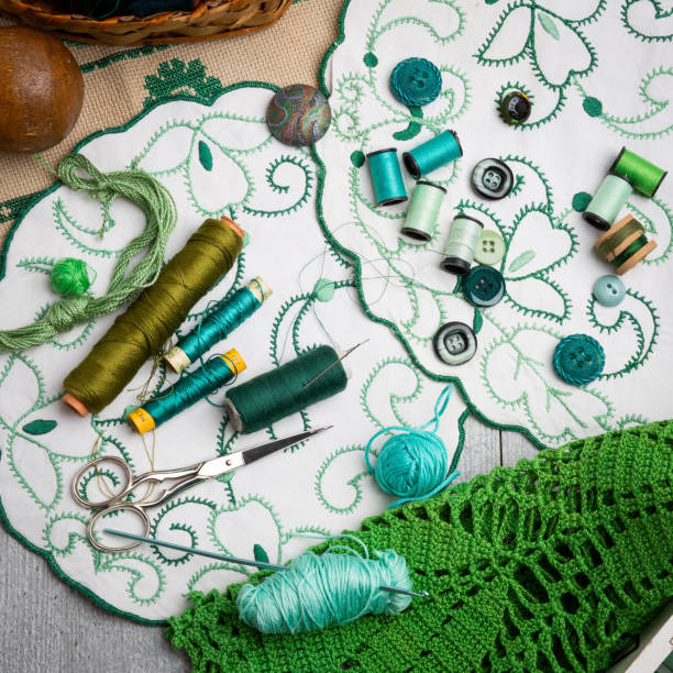 Sewing and embroidery supplies on a  table stock photo
