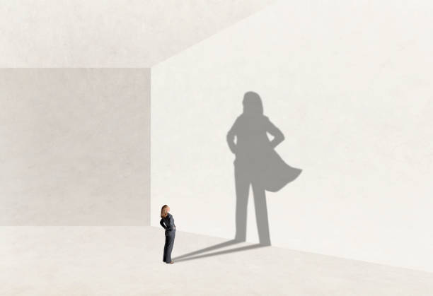 Shadow Of Woman Aspiring To Confidence stock photo