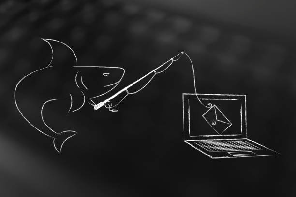 shark with fishing rod with email instead of bait falling into laptop screeen stock photo