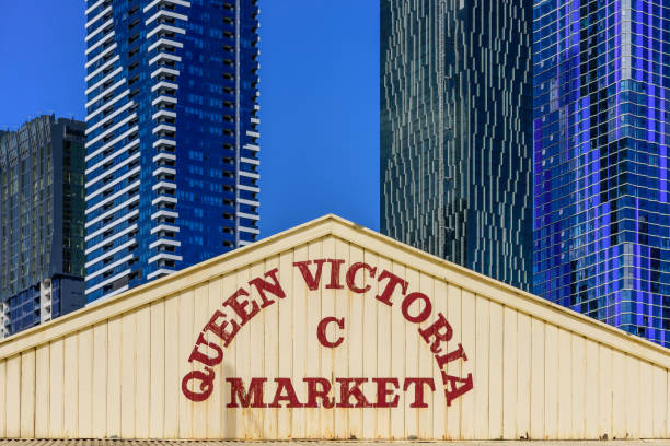 shed C Melbourne, Australia, October 7 :The old sign on the roof of shed C at the Queen Victoria Market in contrast to the modern hi rise skyscrapers behind it. queen victoria market stock pictures, royalty-free photos & images