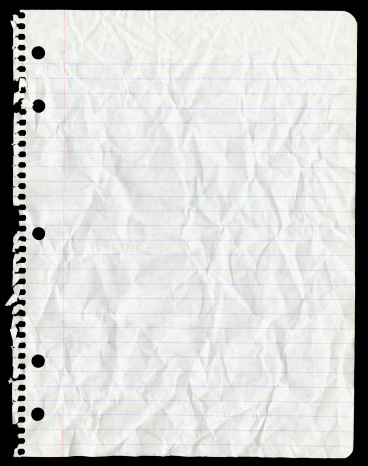 High resolution image of a sheet of paper that has been ripped from a spiral binder, crumpled then smoothed flat leaving wrinkles. White paper with horizontal blue lines and a vertical red line on left. Zoom in to see great details.