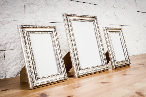 shelf with frames and white wall wooden shelf with frames and white wall with bricks dresser photos stock pictures, royalty-free photos & images