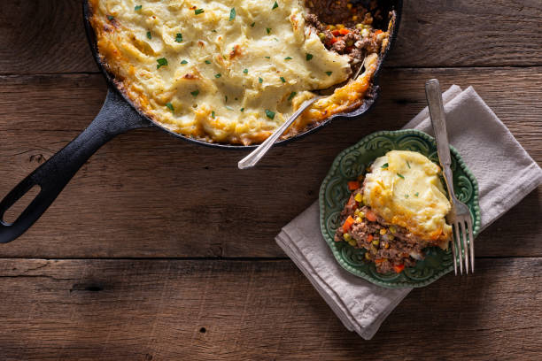 Shepherd's Pie Fresh Shepherd's Pie, Made in a Cast Iron Skillet comfort food stock pictures, royalty-free photos & images