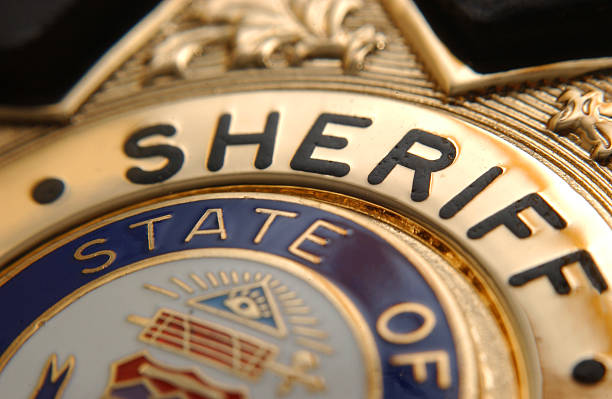 Sheriff Badge A Deputy Sheriff Badge police badge stock pictures, royalty-free photos & images