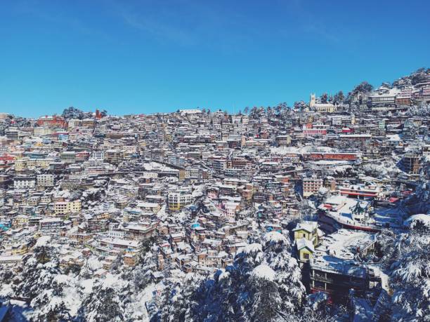 Shimla Town in India under the white blanket of snow. Shimla Town in India under the white blanket of snow. shimla stock pictures, royalty-free photos & images
