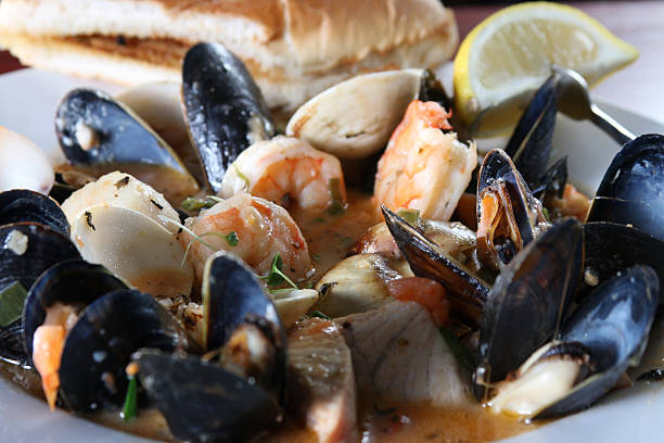 Shimp and mussels with fish, lemon, bread stock photo