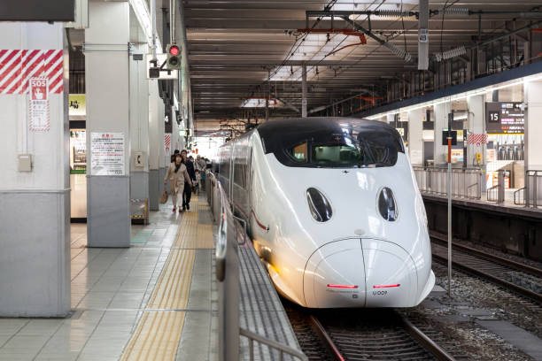 JR Shinkansen 800 series is just arriving at hakata railway station, Fukuoka, Japan. stock photo