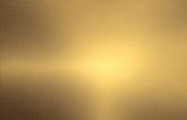 istock Shiny brushed gold color metal background 1170557808