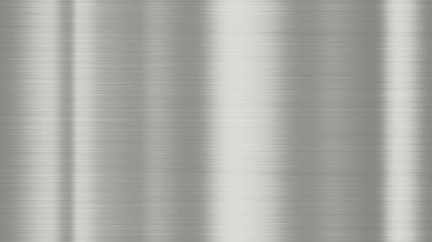 Shiny brushed metal background texture. Polished metallic steel plate. Sheet metal glossy shiny silver stock photo