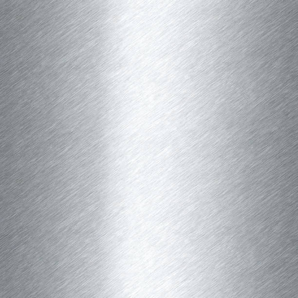 Shiny brushed metal background texture. Polished metallic steel plate. Sheet metal glossy shiny silver. Seamless texture stock photo
