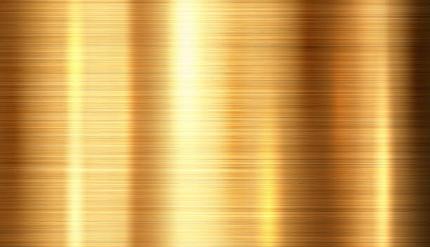 Shiny brushed metallic gold background texture. Bright polished metal bronze brass plate. Sheet metal glossy shiny gold stock photo