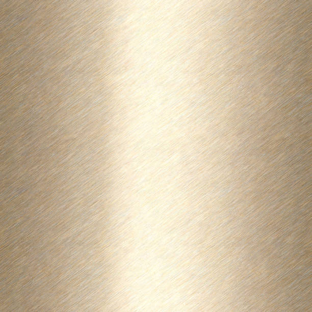 Shiny brushed metallic gold background texture. Polished metal bronze brass plate. Sheet metal glossy shiny gold. Seamless texture stock photo