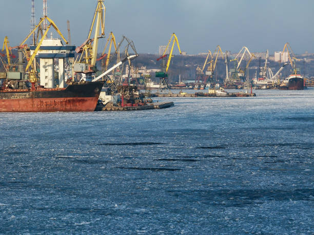 Ship at Mariupol Port at Winter with Ice stock photo