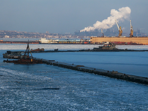 Ship at Mariupol Port at Winter with Ice