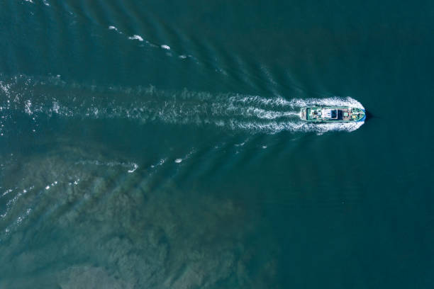 a ship crosses water - aerial boat imagens e fotografias de stock