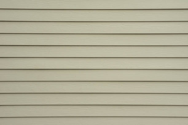 Shiplap Wall Siding Background A background wall of tan shiplap siding. shiplap stock pictures, royalty-free photos & images