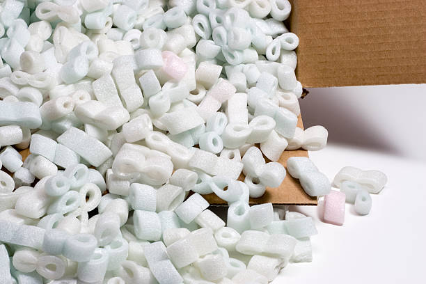 Shipping box and Styrofoam peanuts stock photo