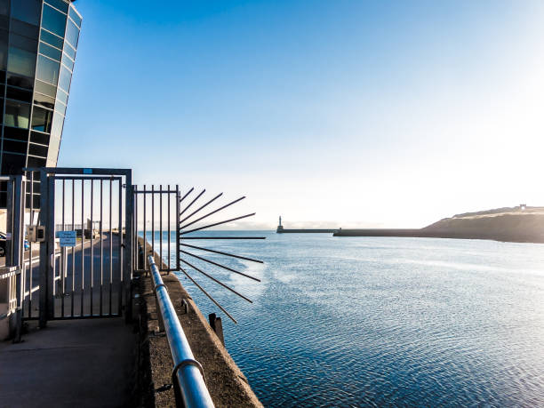 Shipping Control Centre Building Entrance Aberdeen Aberdeen, UK - October 1, 2015: The Aberdeen Shipping Control Centre Building stands in the Footdee area of Aberdeen.  This image taken at dawn in the busy harbour port of Aberdeen, UK, looking out to the Lighthouse, the North Sea and beyond. north pier stock pictures, royalty-free photos & images