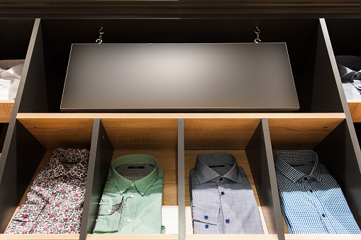 Shirts And Signboard In Mens Clothing Shop Stock Photo - Download Image ...