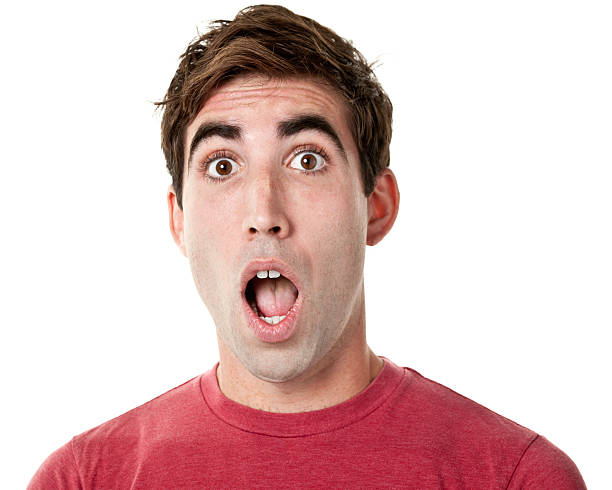 Shocked Gasping Young Man Portrait of a man on a white background.http://s3.amazonaws.com/drbimages/m/bregor.jpg mouth open stock pictures, royalty-free photos & images
